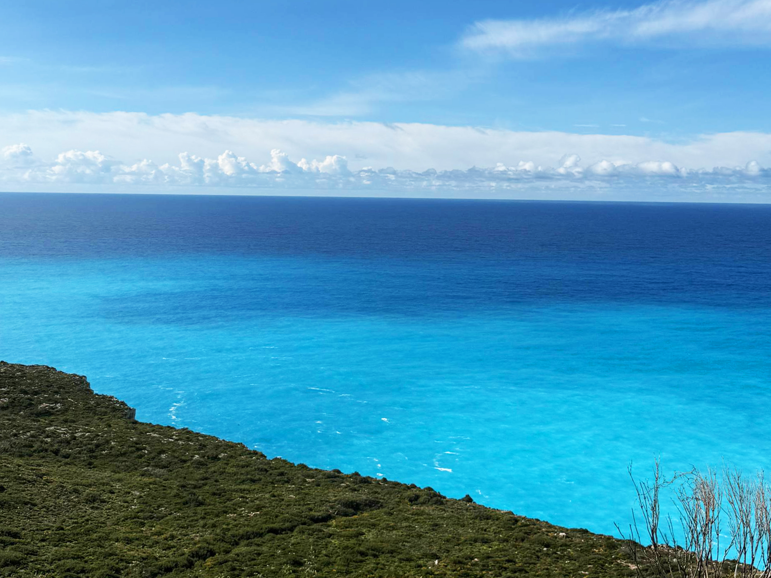 Coastal land for sale in Zakynthos with crystal clear blue water just 200 meters away